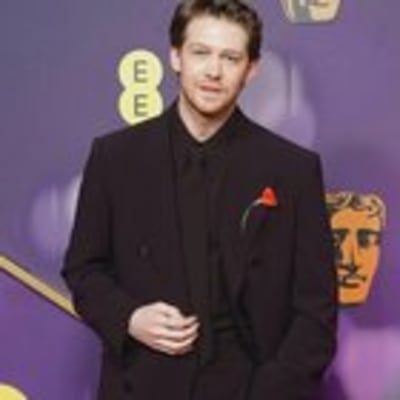 Joe Alwyn dazzles at the 2025 Bafta Awards, showcasing a stunning new look and captivating charm. Don't miss the inside scoop on his unforgettable night!