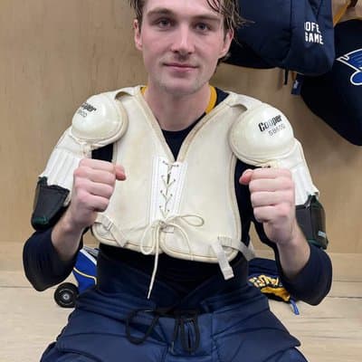 Kelly Rutherford celebrates the Blues' latest victory! Discover how Kelly Chase's iconic shoulder pads transformed into the team's postgame MVP award—bringing a unique twist to locker room traditions! 🏒🎉