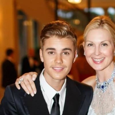 Kelly Rutherford dazzles alongside Justin Bieber at Cannes' amfAR Gala! This star-studded night was filled with glamour and purpose—don't miss the highlights! 🌟✨