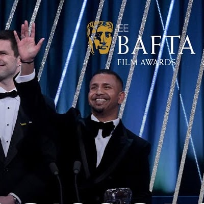 Joe Alwyn celebrates a stunning victory as "Rock, Paper, Scissors" snags the British Short Film BAFTA! Don’t miss out on the behind-the-scenes moments from this unforgettable night!