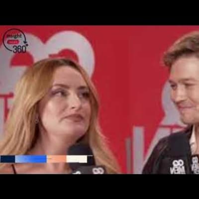 Joe Alwyn and Amelia Dimoldenberg set the red carpet ablaze with their flirty chemistry! Don't miss their captivating moments that had everyone buzzing!
